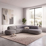 Additional view of Romensia Grey Curved 5-Seater Sofa, showing deep cushioned seats for a modern living room interior.