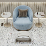 Alternate angle of Roundara Blue Velvet Pedicure Chair, showing wide seating area in a clean, contemporary salon setting.