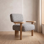 Roviana Upholstered Accent Chair featuring padded seat and backrest in a clear product photograph in a modern home setting.