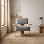 Roviana Upholstered Accent Chair product view showing supportive armrests in a clean, contemporary living room setting.