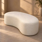 Santilona Cream Upholstered Organic Bench product photo showing curved form and rounded edges in a clean studio setting.
