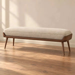 Sokirova Beige Wooden Upholstered Accent Bench featuring padded seat in a clear product photograph in a modern home setting.