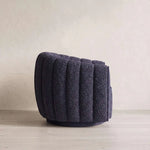 Close-up of Sonkara Navy Blue Pedicure Chair, highlighting swivel base, padded armrests, plush seat, curved backrest.
