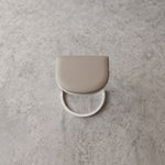 Close-up of Stankery Beige Manicure Hand Rest, highlighting cushioned top with the finish and form clearly visible.