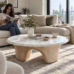 Starmona White Marble Coffee Table product view showing round top and arched base with its construction clearly visible.