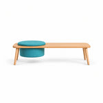 Stepsoly Kids Wooden Floor Table with Pouf viewed from the front, showing a light wood finish alongside a round teal pouf.