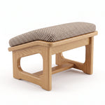 Close-up of Stoolara Beige Pedicure Footrest, highlighting padded cushion with the finish and form clearly visible.