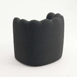 Close-up of Swaisara Black Pedicure Chair, highlighting plush cushioning and curved backrest for a modern salon interior.