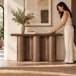 Close-up of Wavypura Wooden Console Table, highlighting wavy base and elongated rectangular top in a modern home setting.