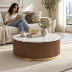 Wilderona White Marble Coffee Table product view showing round profile in a clean, contemporary living room setting.
