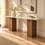 Close view of the Yorkosta console table showing pale marble-look veining, smooth edges, and sturdy brown supports.
