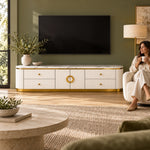 Zondinora White Marble Top TV Unit beneath a wall-mounted TV with a woman nearby, featuring circular gold-tone handles.