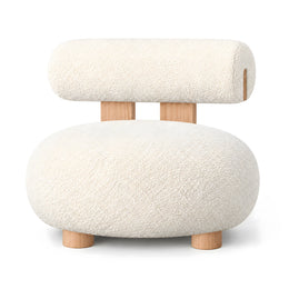 Alternate view of Hipposta Cream Pouf with Backrest, showing rounded padded seat and cylindrical upholstered backrest.
