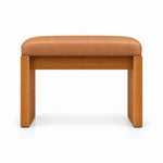 Addelino Wooden Frame Pedicure Footrest: caramel tan leather cushioning, a broad wooden apron and panel-style wooden legs.