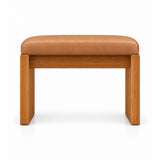 Addelino Wooden Frame Pedicure Footrest: caramel tan leather cushioning, a broad wooden apron and panel-style wooden legs.