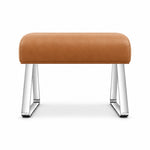 Caramel tan leather cushions the Anoltina Pedicure Footrest, paired with polished metal legs and angled open sled supports.