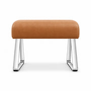 Caramel tan leather cushions the Anoltina Pedicure Footrest, paired with polished metal legs and angled open sled supports.