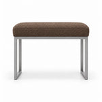Bencivola Pedicure Footrest has a mocha taupe fabric cushion over a slim metal frame, with rectangular metal end supports.