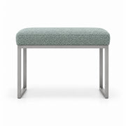 Bencivola Pedicure Footrest displays a sage mist green fabric finish, a slim metal frame and stitched cushion edges.