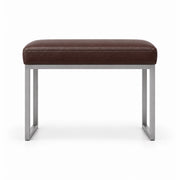 Bencivola Pedicure Footrest pairs a brown leather top with rectangular metal end supports and stitched cushion edges.