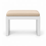 Harteslo Pedicure Footrest with cream beige leather upholstery and straight white end supports, shown against white.