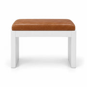 Harteslo Pedicure Footrest with a tan brown leather top, a slim white front rail and a white panel base on a white backdrop.