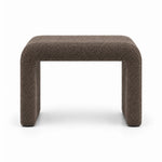 Mocha taupe fabric covers the padded top of the Hoksala Upholstered Pedicure Footrest, paired with rounded padded corners.