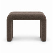 Mocha taupe fabric covers the padded top of the Hoksala Upholstered Pedicure Footrest, paired with rounded padded corners.