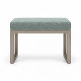 Lupendri Pedicure Footrest upholstered in sage mist green fabric, with a taupe metal frame and open sled-style legs.