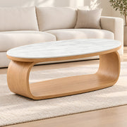 Ovichiko White Marble Coffee Table product photo showing oval top and curved open-loop base in a clean studio setting.