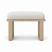 Vendisora Pedicure Footrest has an ivory white fabric cushion over a light wood base, with layered wooden supports.