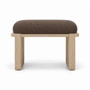 Mocha taupe fabric upholstery tops the Vendisora Pedicure Footrest, above a light wood base and layered wooden supports.