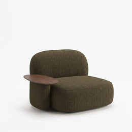 Alternate view of Aerovy Accent Chair, showing integrated side table and generously cushioned seat in a modern home setting.