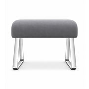Anoltina Pedicure Footrest: a deep grey cushion, angled sled supports and polished metal legs against a white backdrop.
