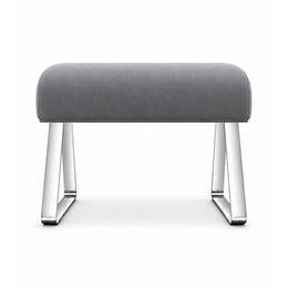 Anoltina Pedicure Footrest: a deep grey cushion, angled sled supports and polished metal legs against a white backdrop.