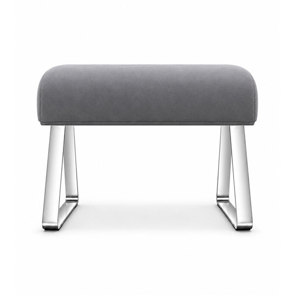 Anoltina Pedicure Footrest: a deep grey cushion, angled sled supports and polished metal legs against a white backdrop.