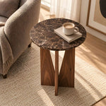 Close-up of Apicko Marble Side Table, highlighting round top and dark brown marble-look appearance in a modern home setting.