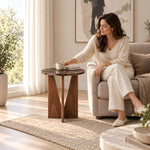 Additional view of Apicko Marble Side Table, showing an open intersecting wood-look base for a modern living room interior.