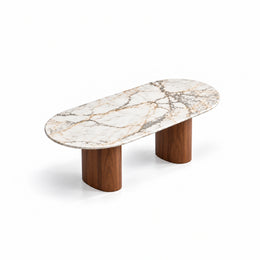 Alternate view of Arcasilora Oval Marble Coffee Table, showing elongated oval top and rounded edges in a modern home setting.