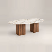 Arvizta Marble Top 6-Seater Dining Table on a neutral studio floor, showing an oval marble top alongside warm wood grain.