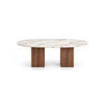 Arvizta Marble Top 6-Seater Dining Table shown with an oval marble top, a long dining surface and pale surface veining.