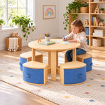 Avestolra Kids Table with 4 Storage Stools: blue fabric storage fronts beside a child seated at the table on a patterned rug.