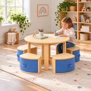 Avestolra Kids Table with 4 Storage Stools: blue fabric storage fronts beside a child seated at the table on a patterned rug.