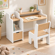 Boorlona White Kids Study Desk with Chair, detailed with a wood writing top and a left open cubby beside a playroom window.