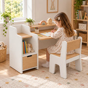 Boorlona White Kids Study Desk with Chair: a raised rear shelf beside a child seated at the table on a patterned rug.