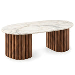 Alternate view of Cavifluta Marble Coffee Table, showing oval top and twin fluted pedestals in a balanced home interior.
