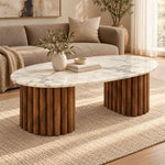 Cavifluta Marble Coffee Table product view showing twin fluted pedestals in a clean, contemporary living room setting.