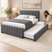 Chikilora Dark Grey Kids Trundle Bed, dark grey upholstery and white bedding, with bedding being arranged on the trundle.