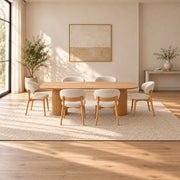 Colioaky Wooden Oval 6-Seater Dining Table product view showing oval tabletop with rounded ends in a modern home setting.
