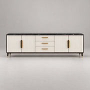 Crimpedy Black Marble Top TV Unit featuring gold-tone handles alongside enclosed side cupboards against a grey backdrop.